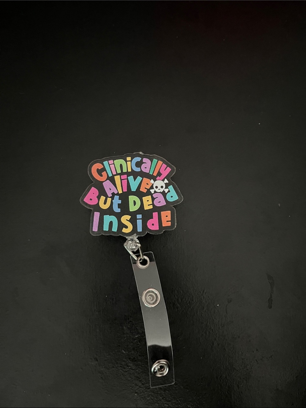 Clinically Alive But Dead Inside Badge Reel - Rainbow Lettering
